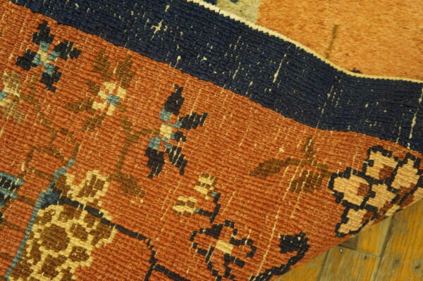 Colorful floral patterned antique rug