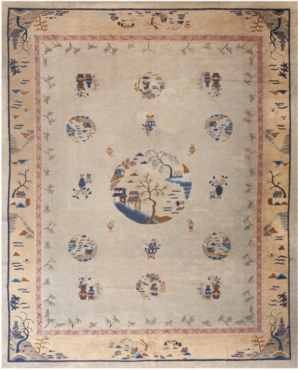 Pale rug featuring a detailed landscape medallion design and scattered vase motifs within wide scenic borders.
