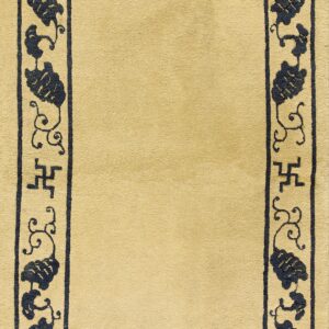 Yellow-beige rug with a navy blue border featuring continuous vine and floral motifs, plus angular symbols.