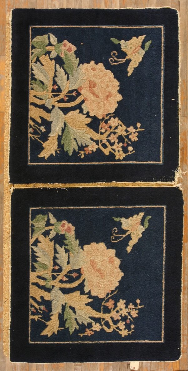 Antique peking square small scatter size wool black & navy rug 1 Pair of navy square rugs featuring tan floral and leaf designs with thick black borders on wood floor.