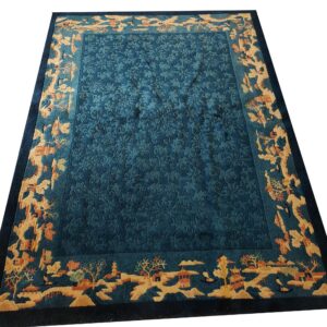 Deep teal rug with an embossed floral pattern and a detailed outer border depicting a gold landscape.
