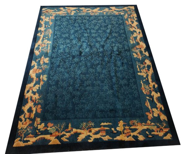 Antique peking small scatter size wool blue, green rug 1 Deep teal rug with an embossed floral pattern and a detailed outer border depicting a gold landscape.