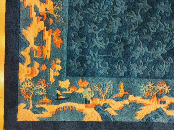 Antique peking small scatter size wool blue, green rug 5 Teal and orange rug corner featuring a carved scenic border and a tone-on-tone blue floral main field.
