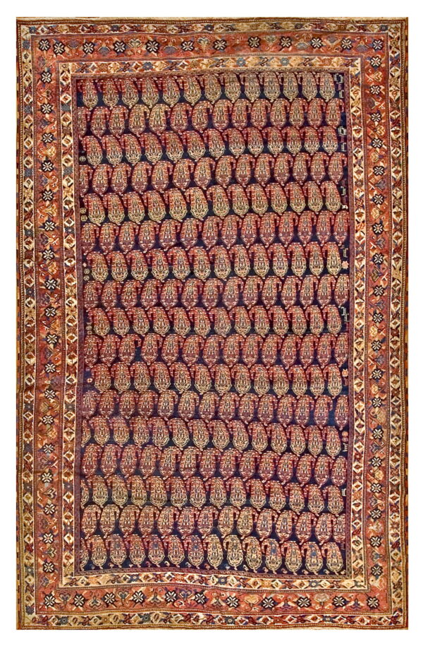 Dark rug with dense rows of reddish paisley motifs, a deep blue field, and wide ornate rust borders.