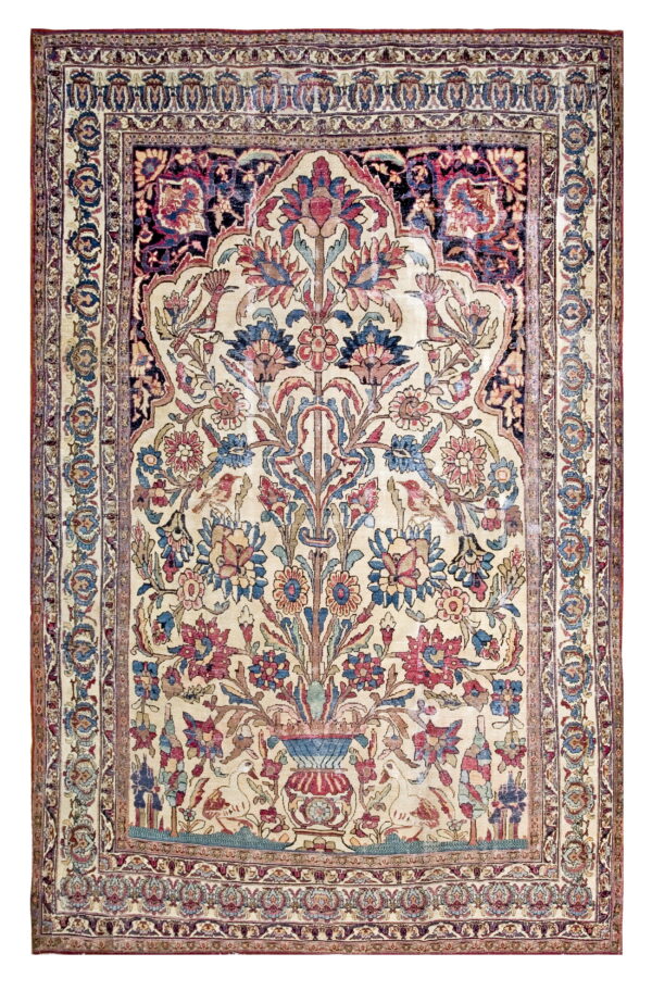 Cream rug with a detailed multicolored tree of life pattern and a dark blue arched section.