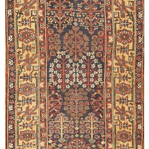 A long runner rug with a dark blue field displaying stylized trees and a light beige geometric border.