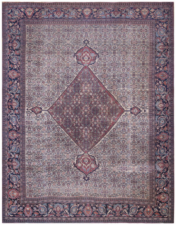 Traditional low-pile rug with a detailed red central medallion, beige field, and navy blue border.