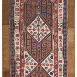 Geometric runner rug featuring stacked dark blue and brown diamond medallions on an off-white field.