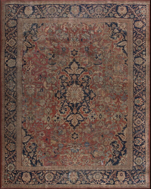 Low-pile ornamental rug in red and navy blue with a central medallion and detailed botanical motifs.