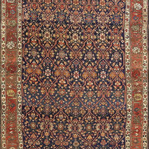 Highly detailed blue rug with a dense all-over floral pattern and wide contrasting red borders.