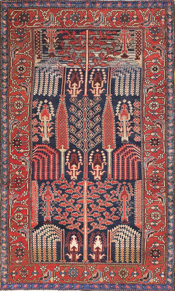 Geometric rug with a dark blue field, detailed red borders, and stylized tribal tree motifs.