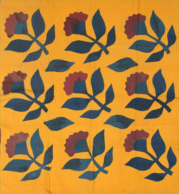 Repeating botanical pattern with deep blue and reddish-brown florals on a textured golden yellow background.