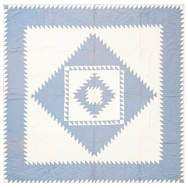 Geometric textile featuring concentric blue and white diamond patterns composed of saw-tooth triangles.
