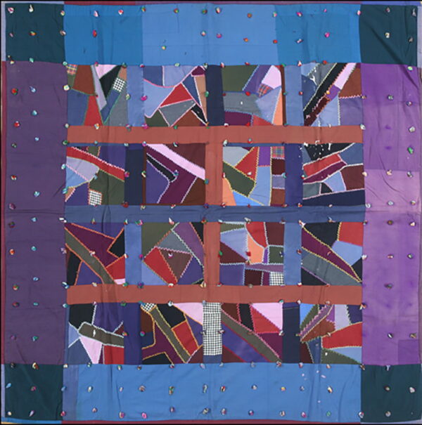 Colorful textile featuring abstract patchwork squares divided by brown stripes and solid purple and blue borders.