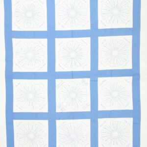 Geometric blue and white textile with twelve square panels, each containing a circular, fan-like pattern with script.