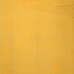 Solid yellow fabric backing displaying faint quilted stitch lines in a diamond pattern across the surface.