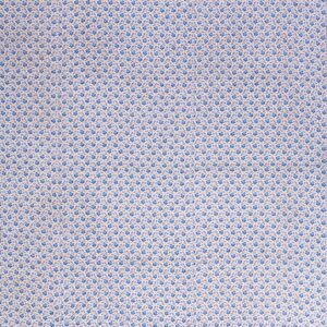 Flat woven rug featuring a micro-floral pattern in blue and muted tan on a light background.