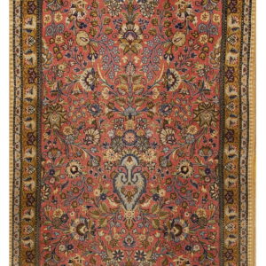 Narrow runner rug with a muted rose field, detailed floral design, and mustard yellow border.