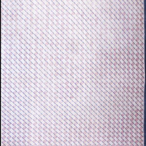 A low-pile rug features a diagonal geometric cube pattern in pink, white, and navy blue with a solid border.