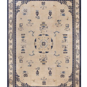 Cream rug with a detailed navy blue central medallion, scattered vases, and a geometric border.
