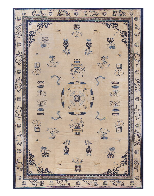 Cream rug with a detailed navy blue central medallion, scattered vases, and a geometric border.