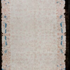 Elegant ivory rug with floral border.