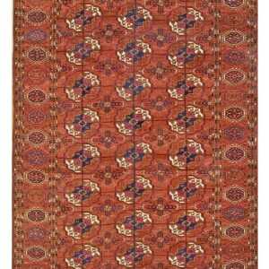 Terracotta runner rug featuring repeating geometric medallions in cream, dark blue, and purple.