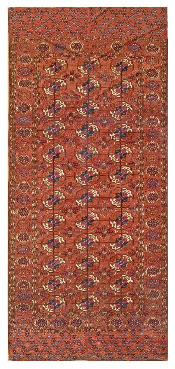 Terracotta runner rug featuring repeating geometric medallions in cream, dark blue, and purple.