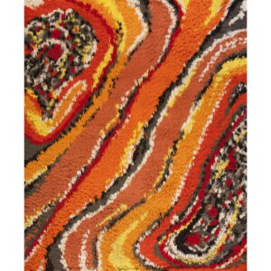 Abstract shag rug featuring vibrant, wide swirls of orange, yellow, red, black, and white fibers.