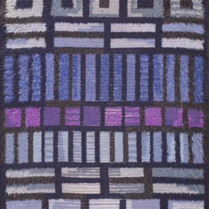 Textured, high-pile rug displaying a geometric grid pattern in shades of navy, purple, blue, and gray.