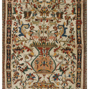 Ivory rug displaying a detailed multicolored floral Tree of Life pattern, vase, and stylized animal figures.