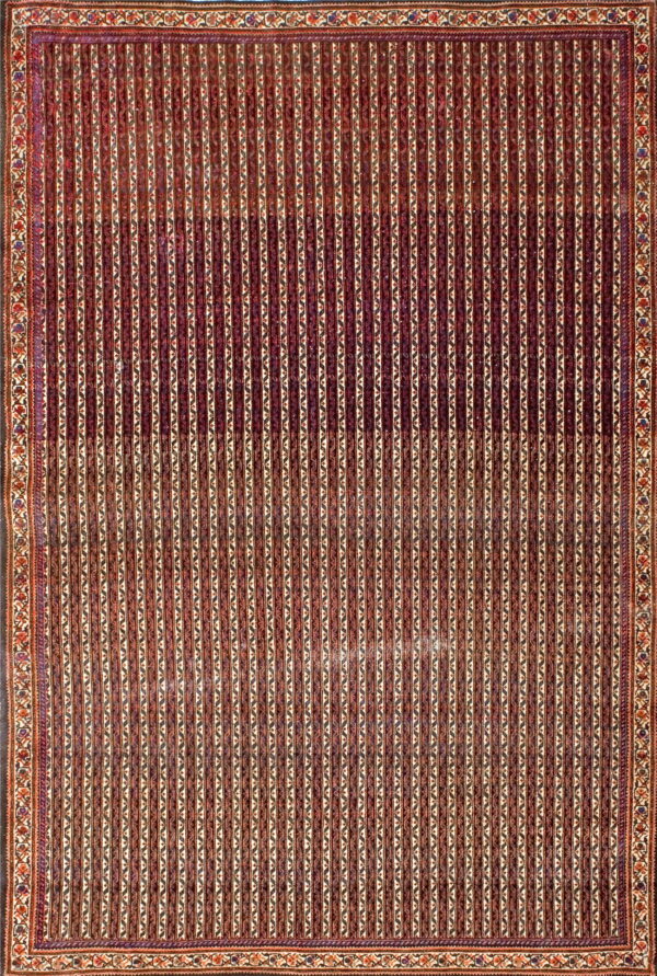 Full view of a rug featuring vertical maroon and cream stripes with intricate floral and geometric borders.