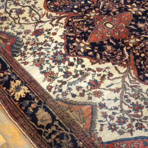 Intricate floral patterns on vintage rug
