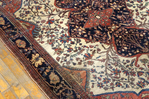 Intricate floral patterns on vintage rug