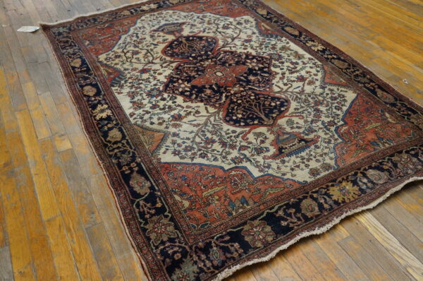 Intricate persian rug with floral patterns.