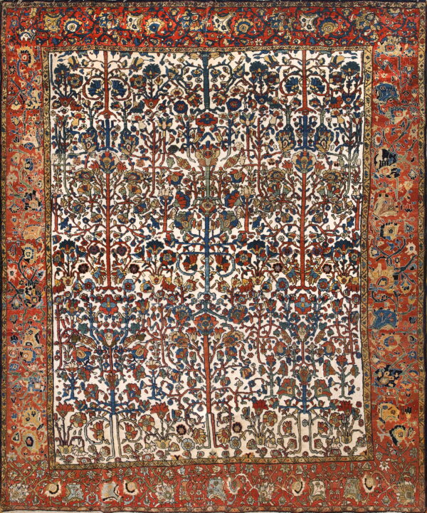 Intricate tree of life pattern rug with a white background and deep red borders, showing wear.