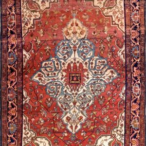 Intricate floral design on coral background.