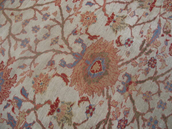 Intricate floral pattern on ivory background