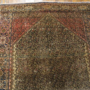 Intricate patterned antique wool rug