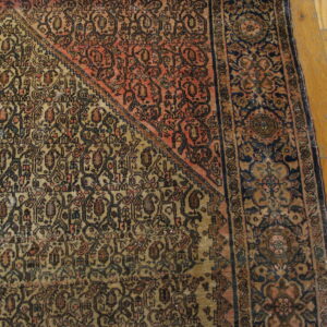 Intricate patterned antique wool rug