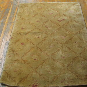 Olive green patterned antique wool rug