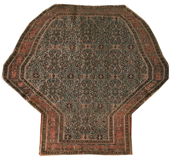 Octagonal rug with a niche extension, featuring detailed dark blue, beige, and terracotta floral patterns.