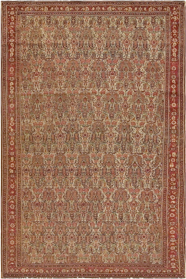 Traditional rug featuring an all-over stylized pattern of red, pink, and ivory, framed by a thick red border.