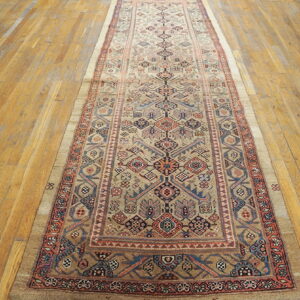 Intricate patterned vintage hallway runner rug