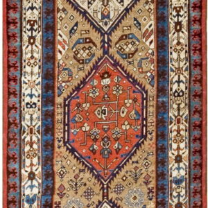 Vertical runner rug showing geometric medallions in terracotta, navy, and cream on a light brown field.