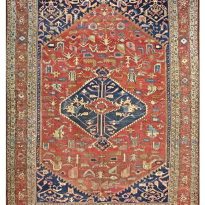 Navy and rust tribal rug featuring a central diamond medallion and dense geometric patterns.