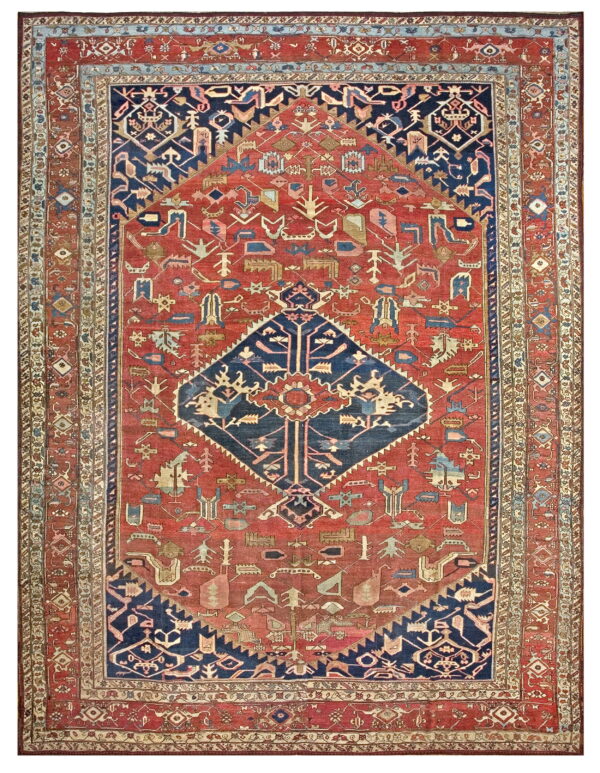 Navy and rust tribal rug featuring a central diamond medallion and dense geometric patterns.