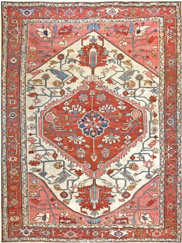 A low-pile rug with a large rust and coral geometric medallion centered on a cream colored field.