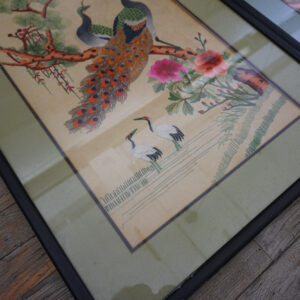 Detail of early 20th century square silk embroidery featuring traditional Chinese motifs