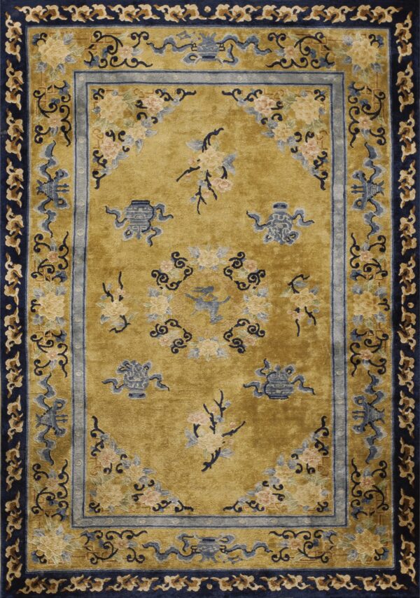 Rectangular rug with a golden field, navy blue borders, and intricate blue and peach floral designs.